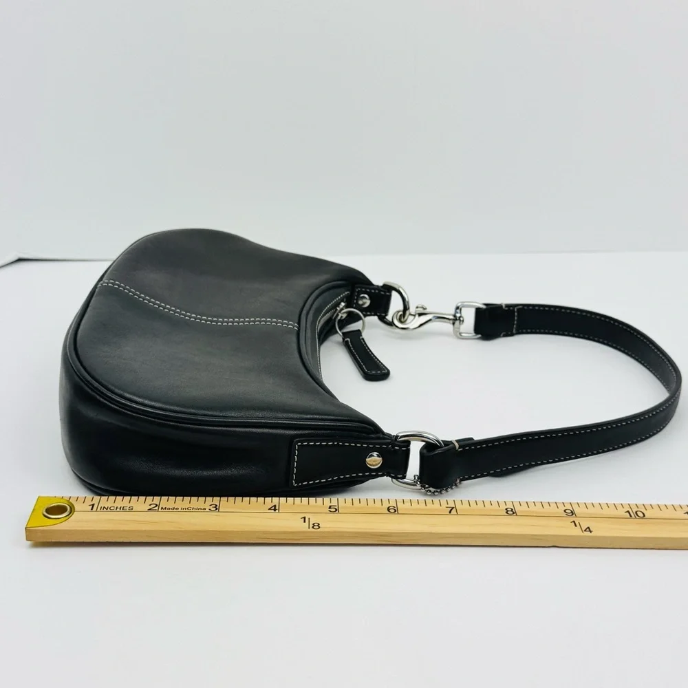 Coach Vintage Hampton Demi Hobo. Smooth, soft black leather. Crescent shape.
